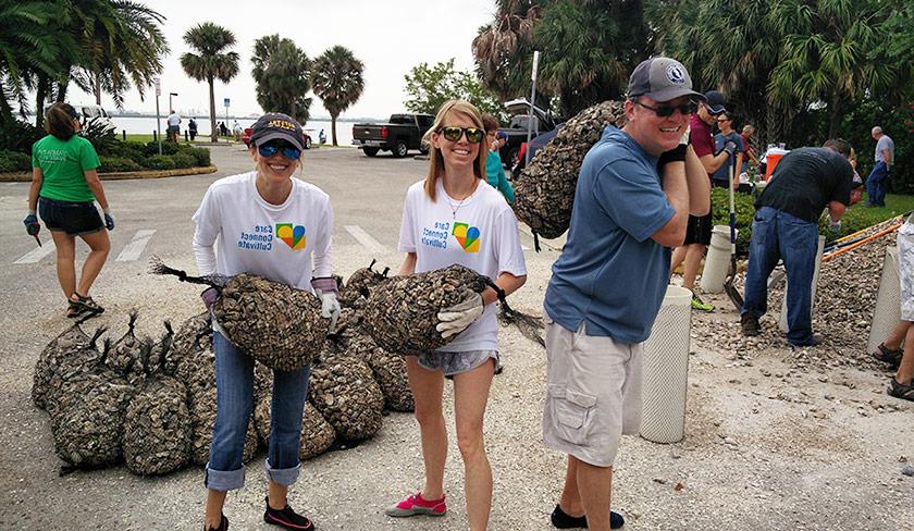 Employees volunteering to help the environment